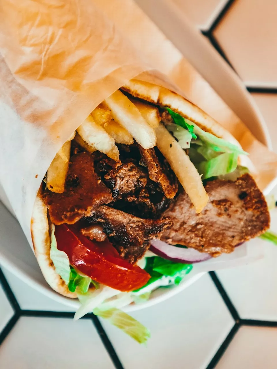 Doner kebab meat being sliced fresh at Red City Grimethorpe